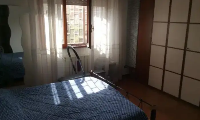 Rexer-Roma-Bilocale-con-posto-auto-CAMERA-DA-LETTO