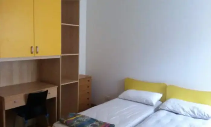 Rexer-LAquila-Bilocale-arredato-CAMERA-DA-LETTO