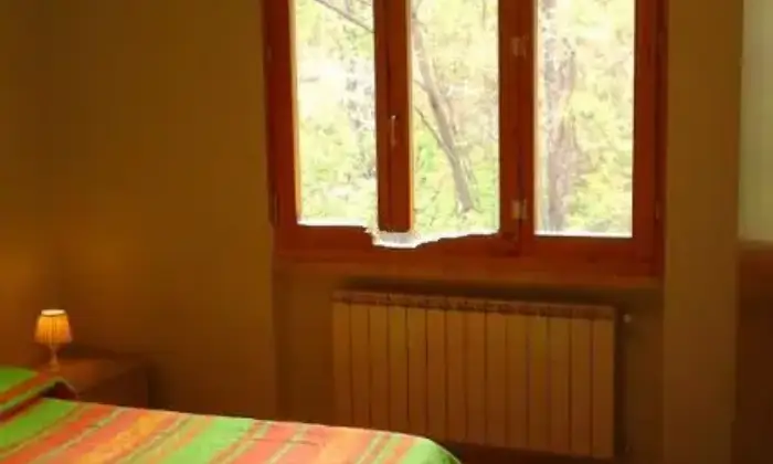 Rexer-Cutigliano-Attico-luminoso-CAMERA-DA-LETTO