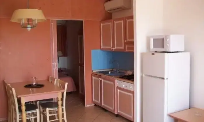 Rexer-Olbia-SARDEGNA-COSTA-SMERALDA-RESIDENCE-NURAGHE-agosto-CUCINA